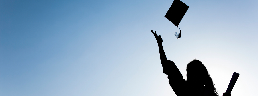silhouette of a student with a graduation cap